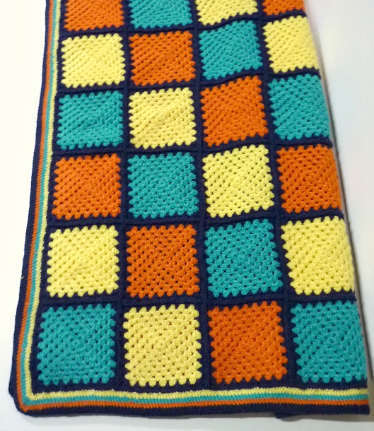 vintage 60s knitted patchwork green, orange & yellow blanket